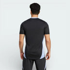 Rear view of the t-shirt, highlighting the clean, unbranded back panel and the precision stitching at the hem.