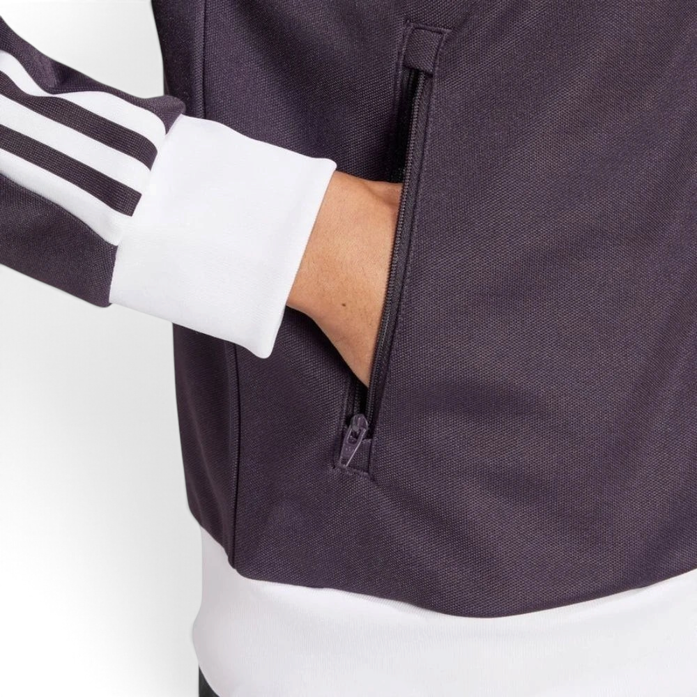 Highlights the unreal finish of the cotton-blend weave and the pocket zip detail.
