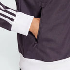 Highlights the unreal finish of the cotton-blend weave and the pocket zip detail.