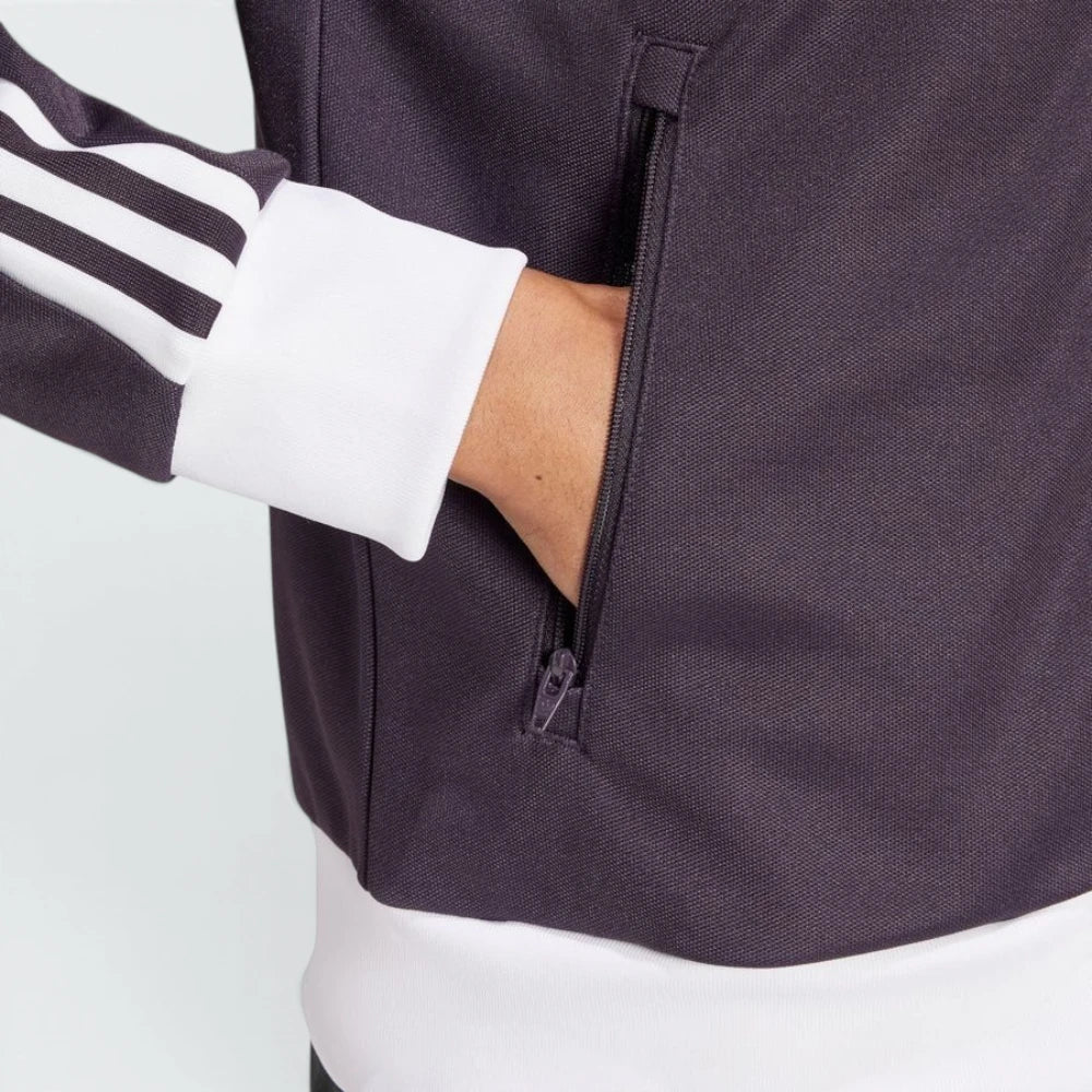 Highlights the unreal finish of the cotton-blend weave and the pocket zip detail.