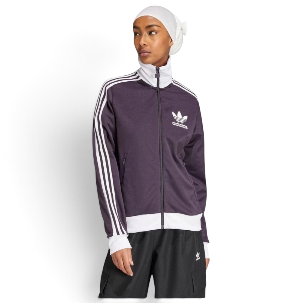 Highlights the high-velocity white 3-Stripes and the professional depth of the Aurora Black fabric.