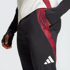 Emphasizing the tapered athletic silhouette and the crisp white heat-applied crest.