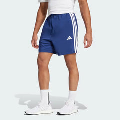 The Dark Blue Chelsea shorts, highlighting the high-contrast white 3-Stripes and the clean athletic hem.