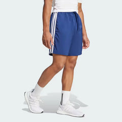 Emphasising the regular fit and the deep front pocket entries.