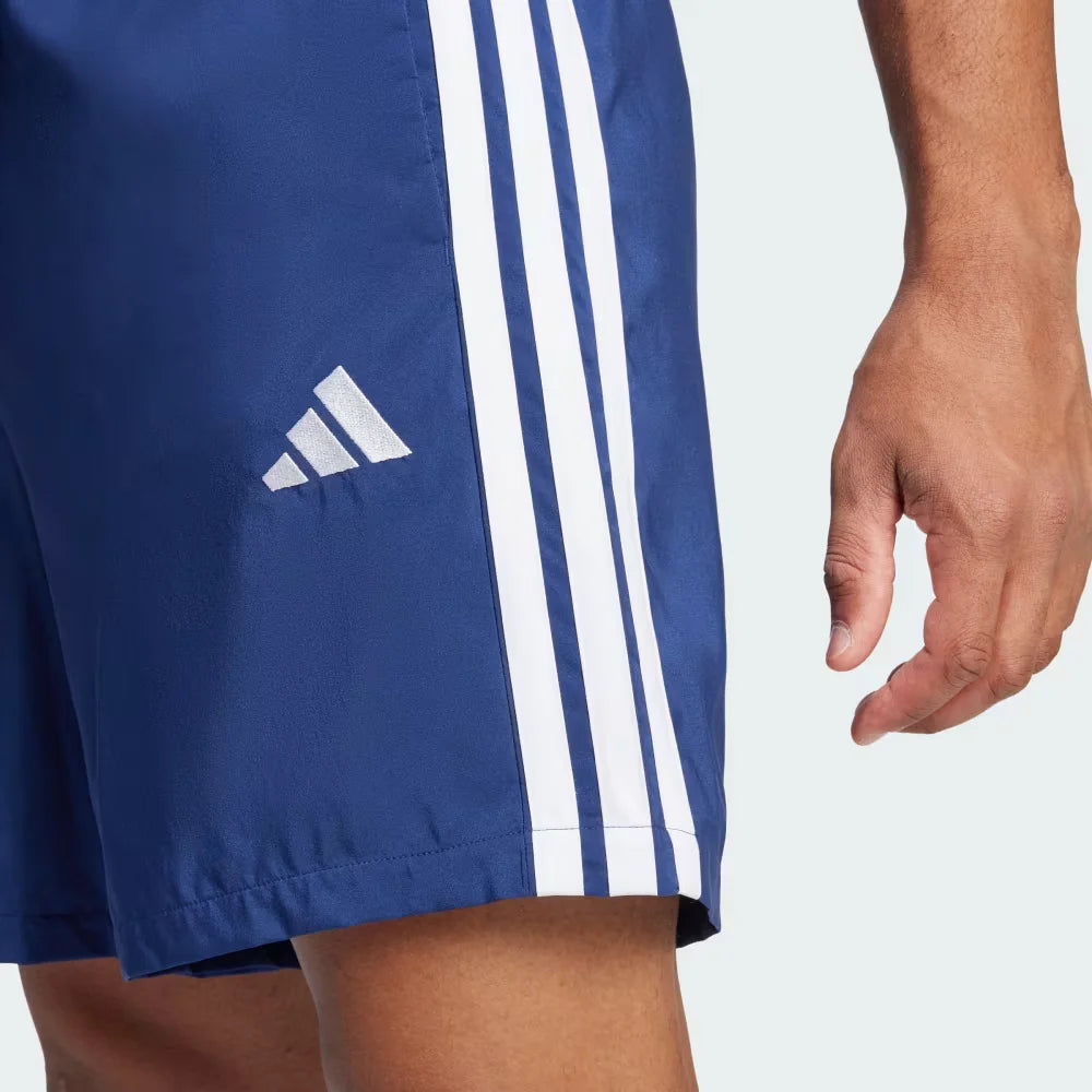 A close-up of the printed Adidas logo on the left leg and the quality of the white stripe taping