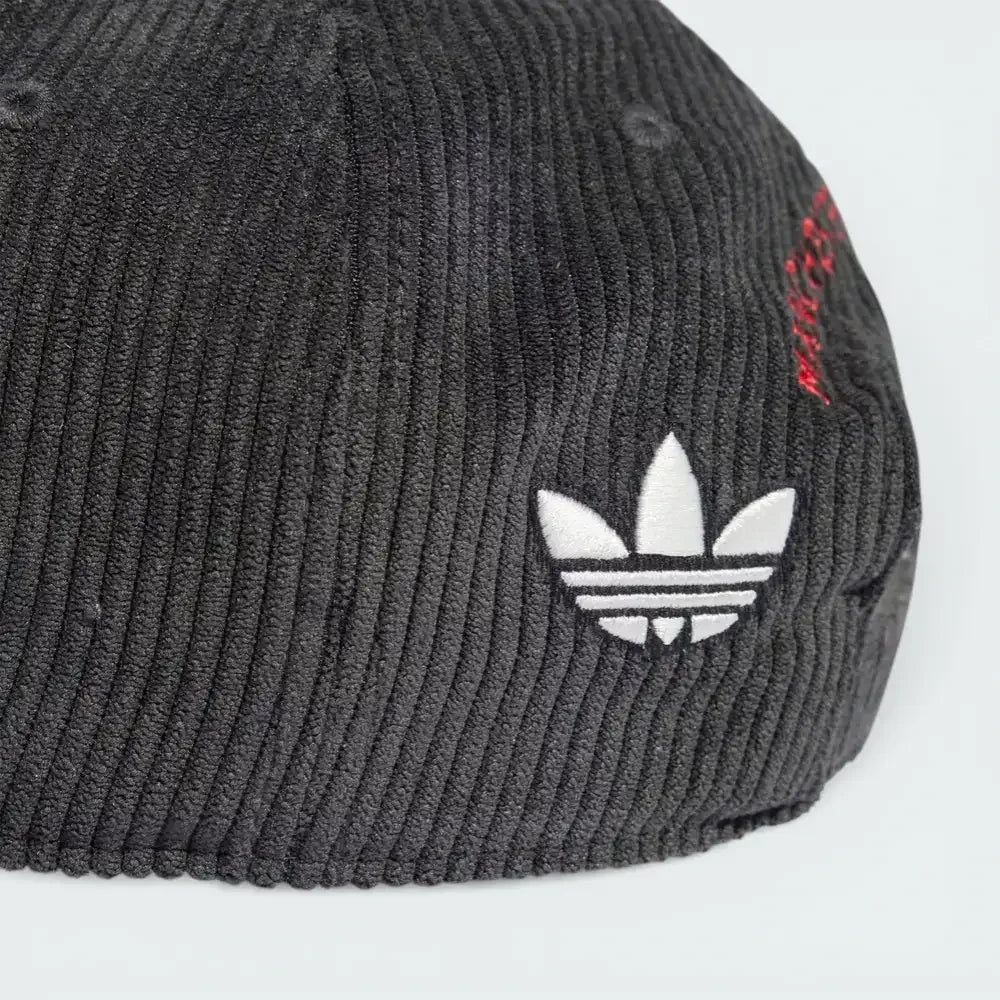 Rear view focusing on the adjustable strap-back closure and the small adidas logo tag.