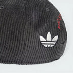 Rear view focusing on the adjustable strap-back closure and the small adidas logo tag.