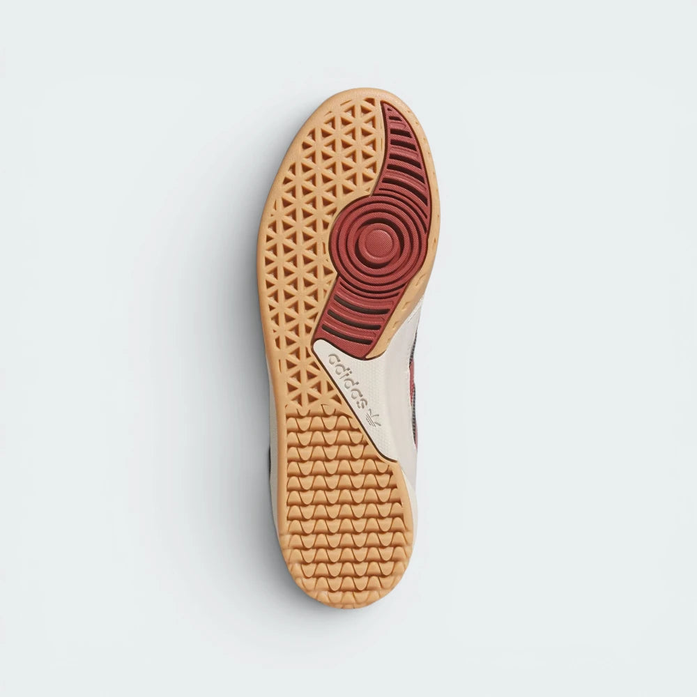 Displays the specialized vector traction pattern of the gum rubber outsole, engineered for unreal multi-directional skate grip and footboard control.