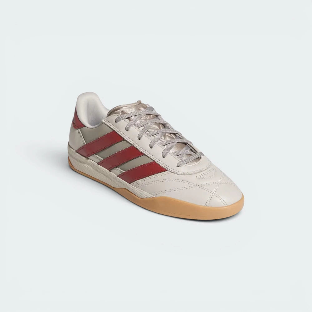 Emphasising the low-profile casual silhouette and the professional alignment of the beige leather panelling.
