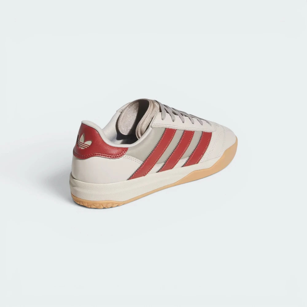 Focuses on the contoured shape of the leather heel counter and the clean finish of the low-profile gum sole wrapping.