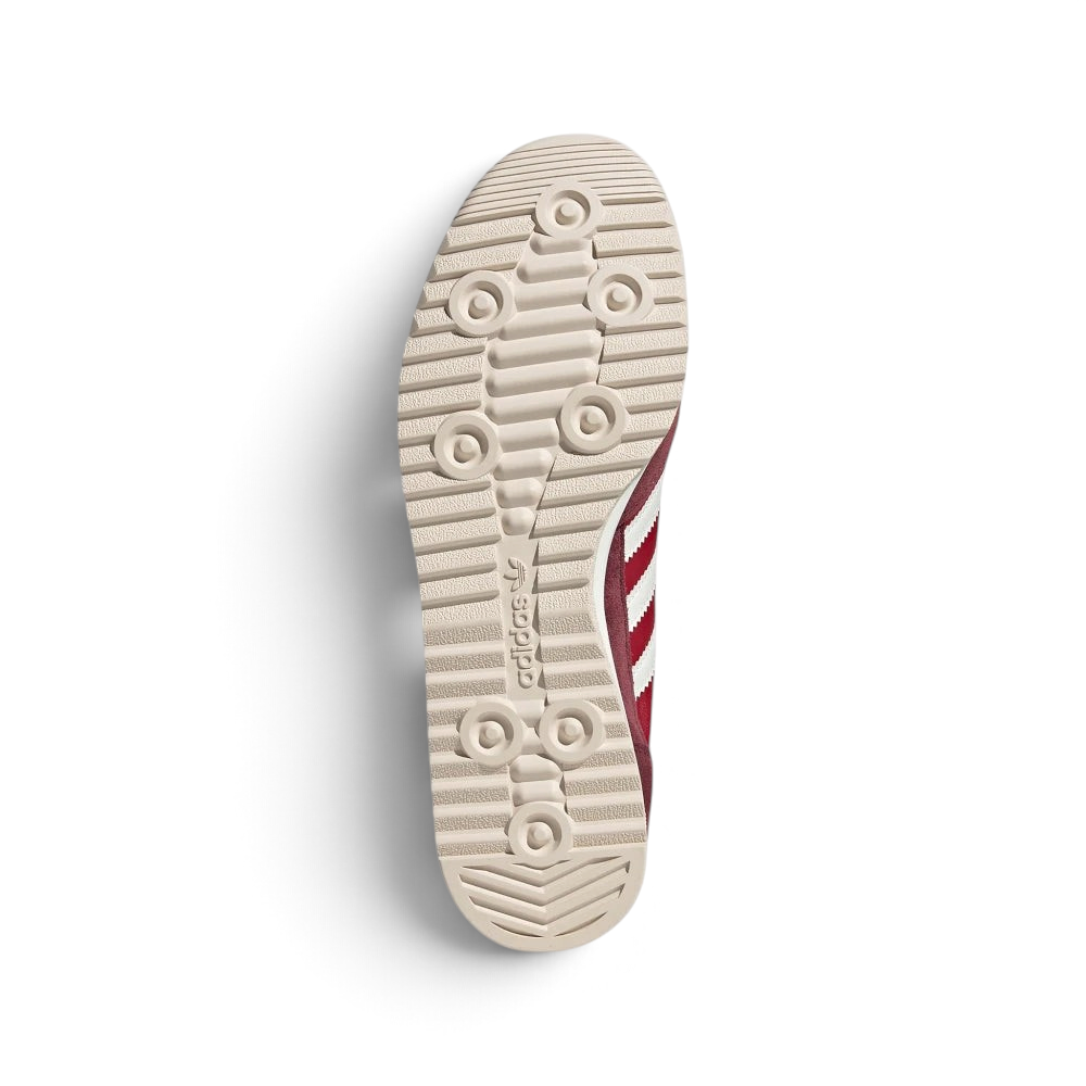 Displays the historic textured cleat-like rubber tread pattern engineered for unreal everyday multi-surface grip.