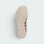 Displays the historic textured cleat-like rubber tread pattern engineered for unreal everyday multi-surface grip.