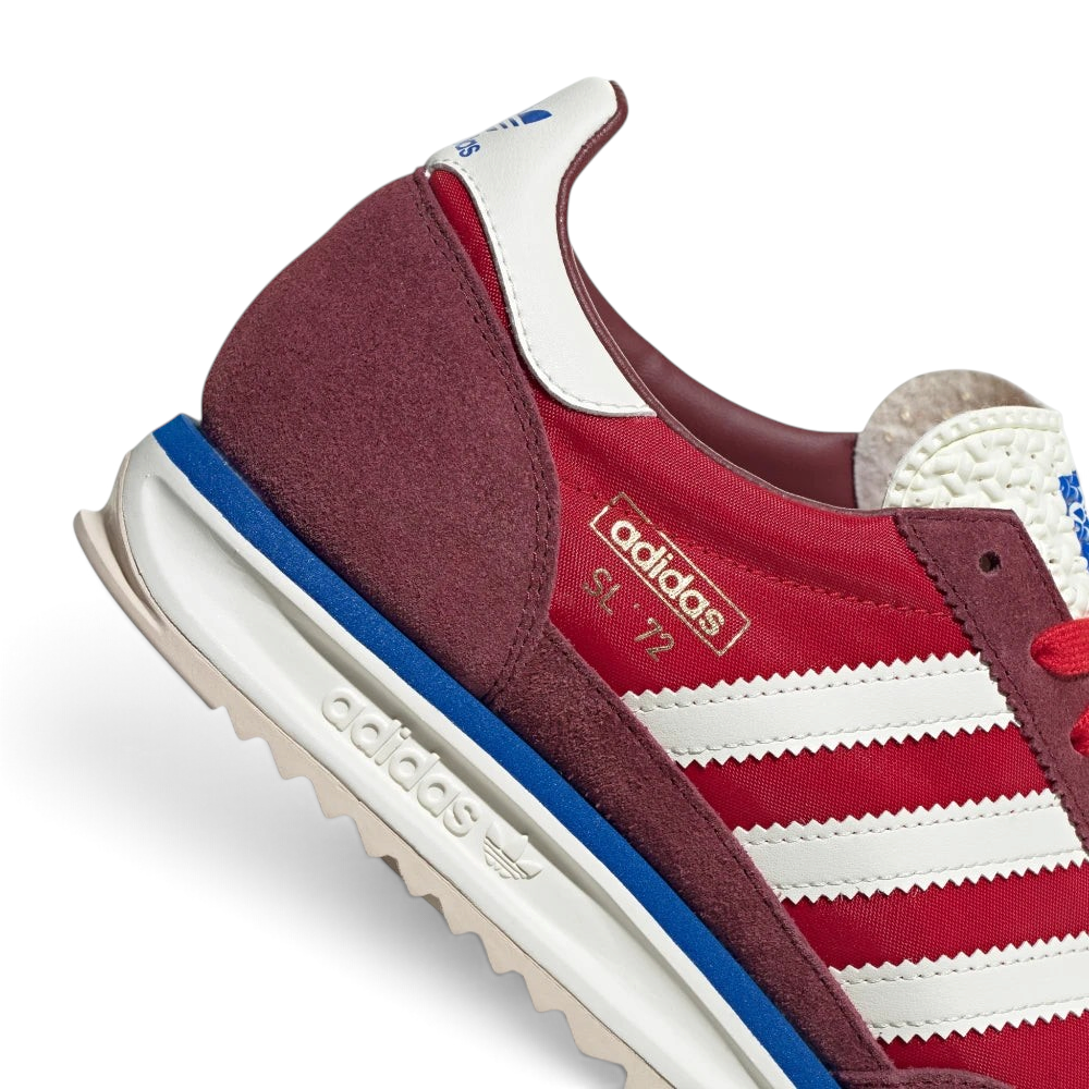 Highlights the "unreal" clean finish where the serrated rubber outsole anchors to the dual-density blue and white cushioning foam.