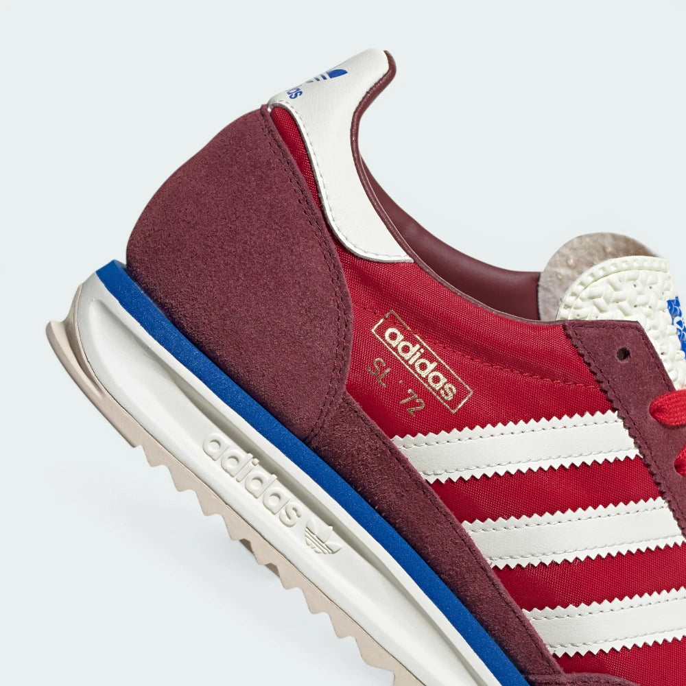 Highlights the "unreal" clean finish where the serrated rubber outsole anchors to the dual-density blue and white cushioning foam.