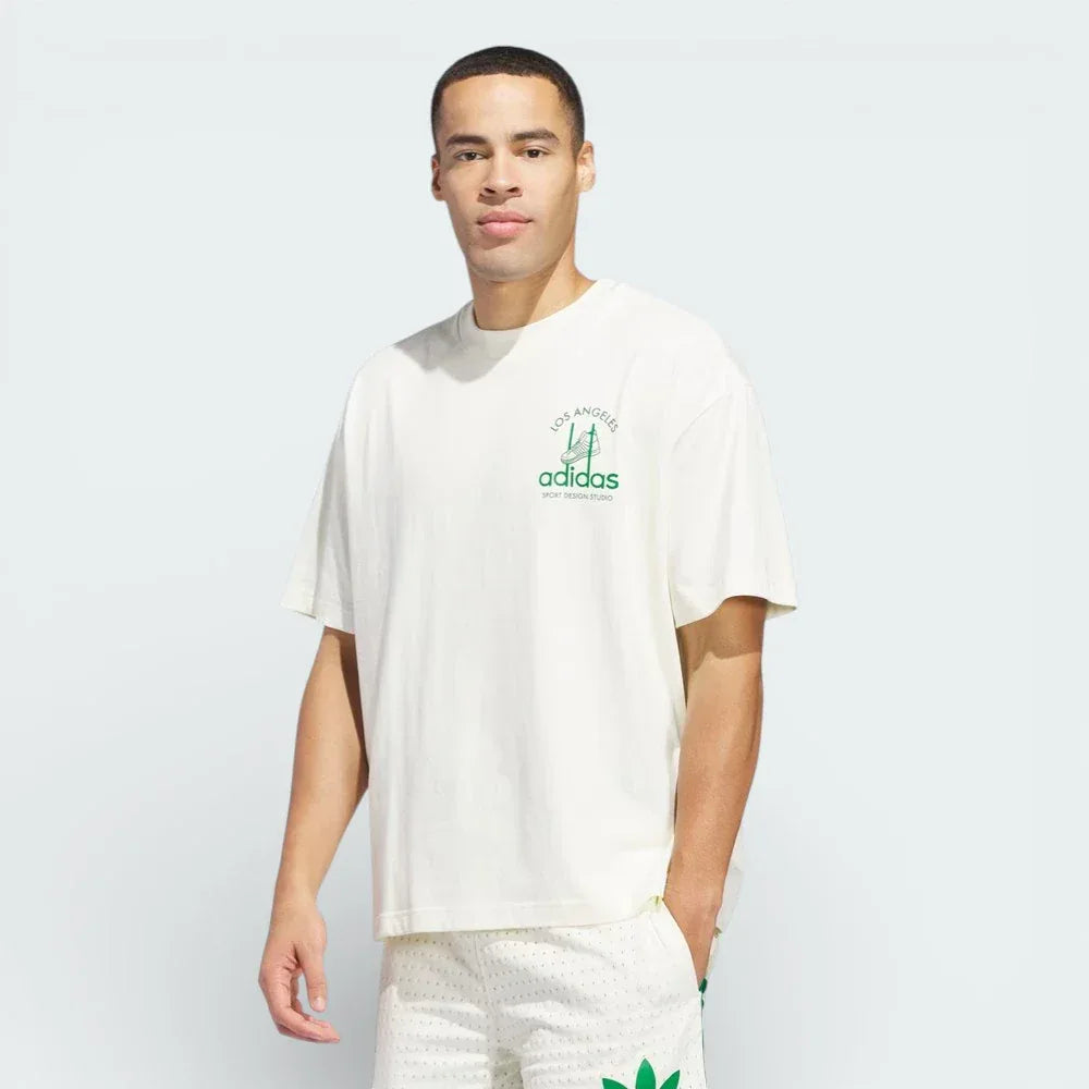 Front profile of the Ivory Kareem Abdul-Jabbar tee, showcasing the relaxed drop-shoulder design and the loose-fit silhouette. Main image
