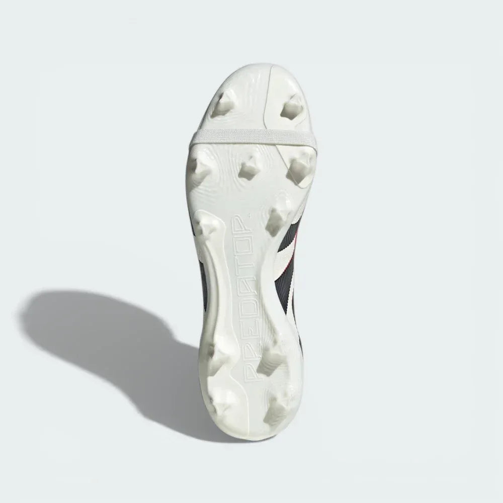 View of the gold-tinted Controlframe 2.0 outsole, showcasing the specialized firm ground stud configuration for elite stability.