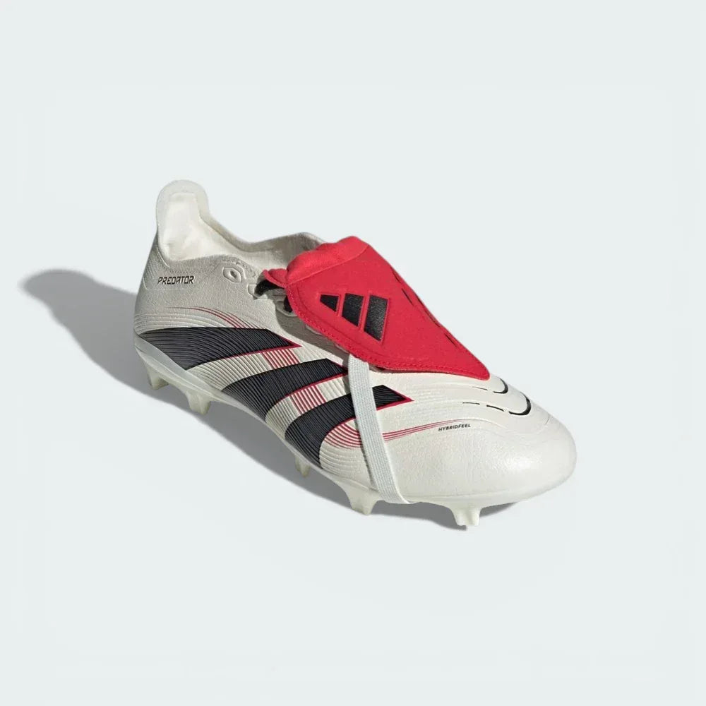 Three-quarter view of the boots, highlighting the contrast between the matte black HybridTouch 2.0 upper and the shimmering gold accents.