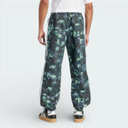 Rear view of the track pants, highlighting the clean finish of the Legend Ivy green and the structured fit.