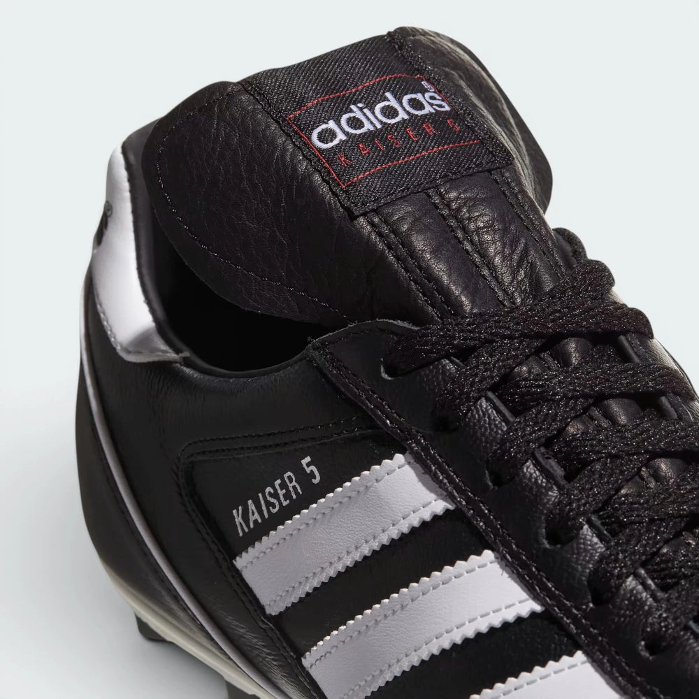 Details the premium dual-stitching lines crossing the leather toe cap control zone and the precision lacing configuration eyelets.
