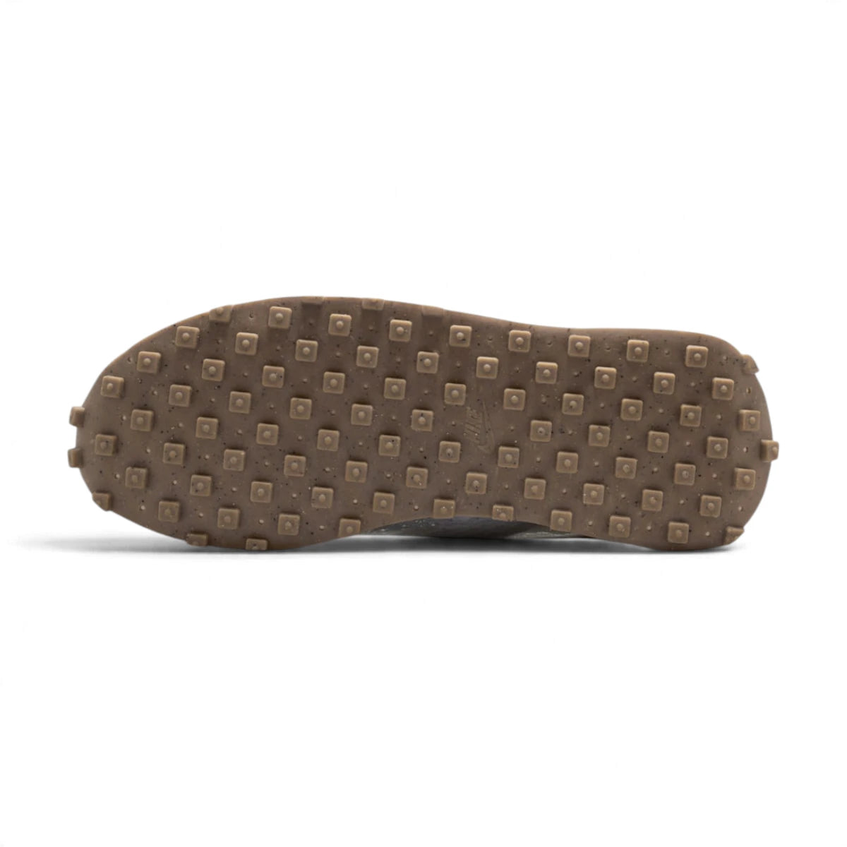 Bottom profile of the shoe displaying the brown waffle rubber outsole tread pattern with classic square studs and embedded Nike branding.