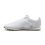 Clean lateral side profile highlighting the breathable white Flyknit weave, synthetic leather heel overlay, and flared midsole geometry.