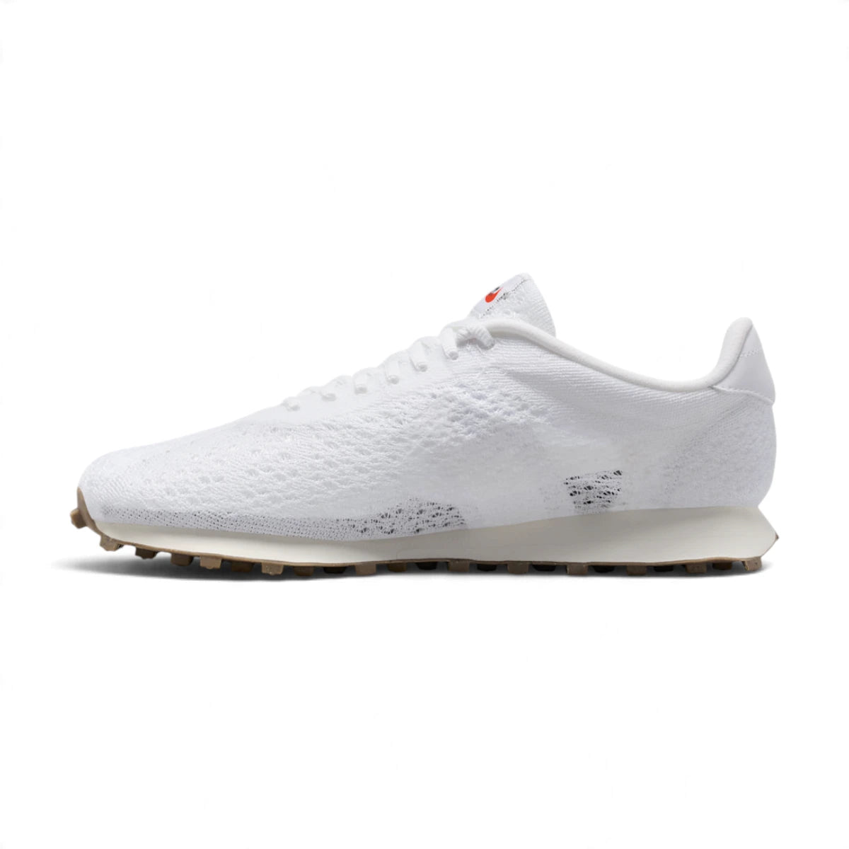 Clean lateral side profile highlighting the breathable white Flyknit weave, synthetic leather heel overlay, and flared midsole geometry.