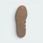 Displays the technical pivot-point geometric traction pattern of the gum rubber outsole, engineered for unreal everyday multi-surface street grip.
