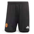 Clean overhead studio layout of the shorts displaying the elasticated drawcord waistband, regular leg openings, woven Manchester United crest, and white adidas logo.