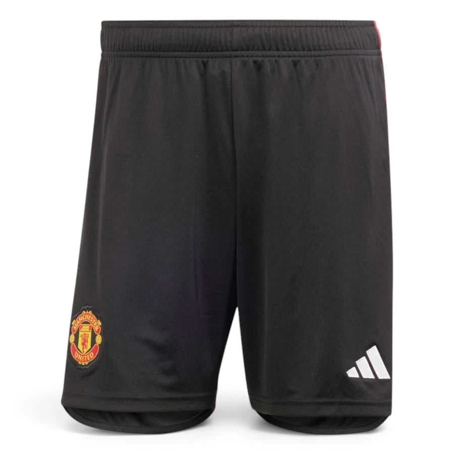 Clean overhead studio layout of the shorts displaying the elasticated drawcord waistband, regular leg openings, woven Manchester United crest, and white adidas logo.