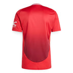 Rear-facing overhead view of the red jersey, displaying the clean unbranded back panel featuring the subtle gradient fade.