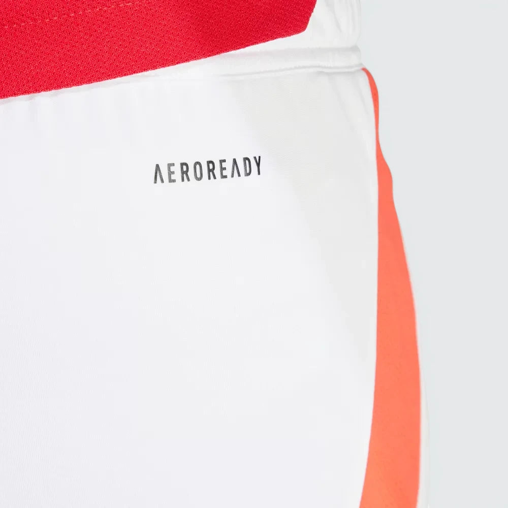 Highlighting the soft texture of the recycled polyester and the moisture-wicking properties.