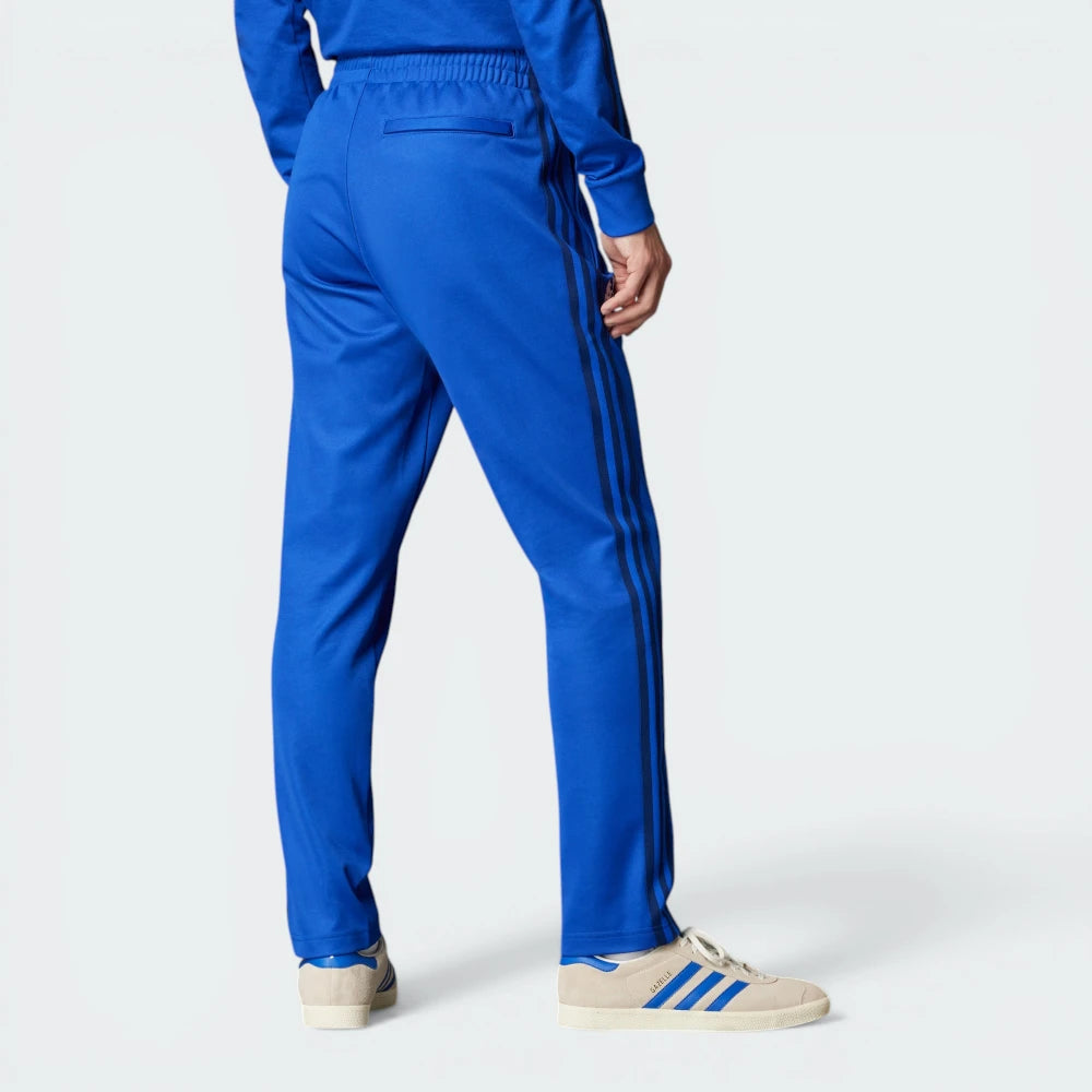 Focusing on the clean back welt pocket and the tapered ankle cuffs.
