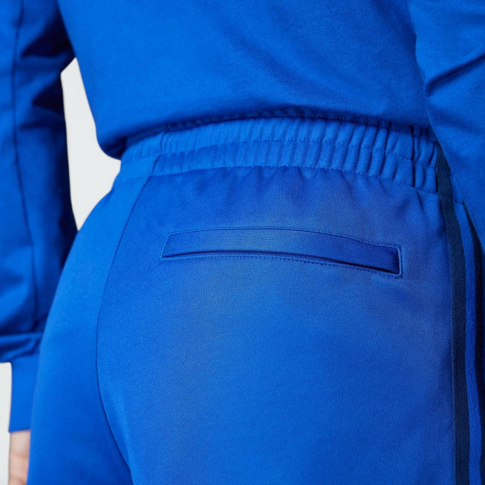 Close-up of a blue outfit with a pocket on a white background