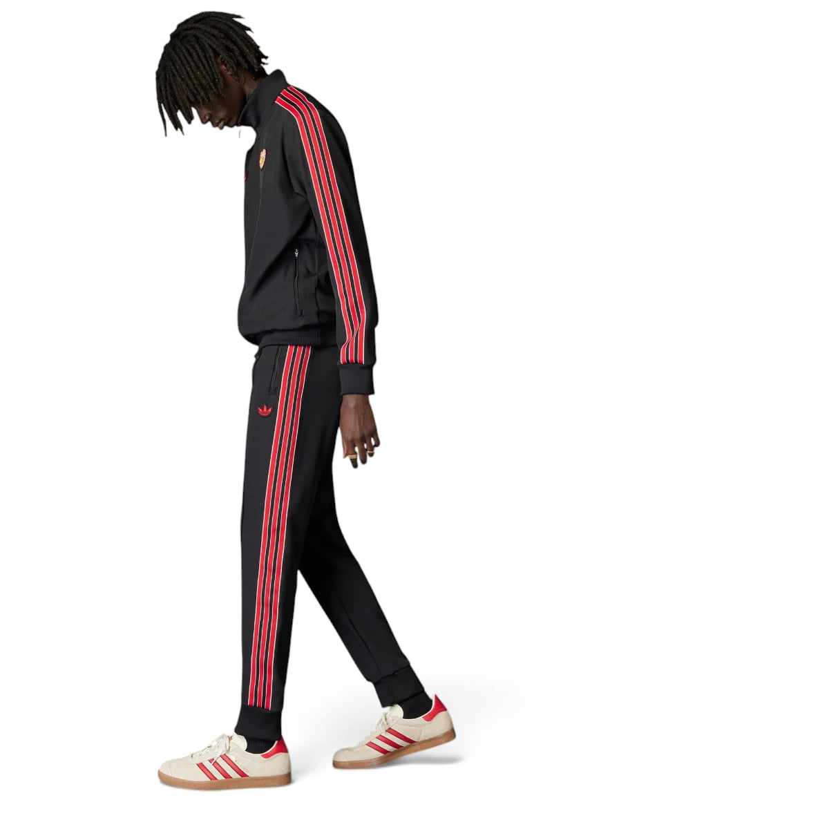 Detailed close-up angle capturing the secure front zipper pocket hardware and the embroidered red adidas Trefoil logo positioned neatly on the hip.