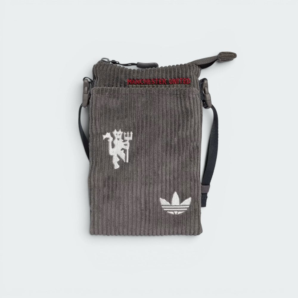 Highlights the high-velocity corduroy texture and the professional depth of the charcoal colour.