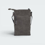 Focuses on the clean lines of the corduroy and the professional finish of the stitching.
