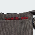 Details the high-definition embroidery and the precision of the club's "MANCHESTER UNITED" 