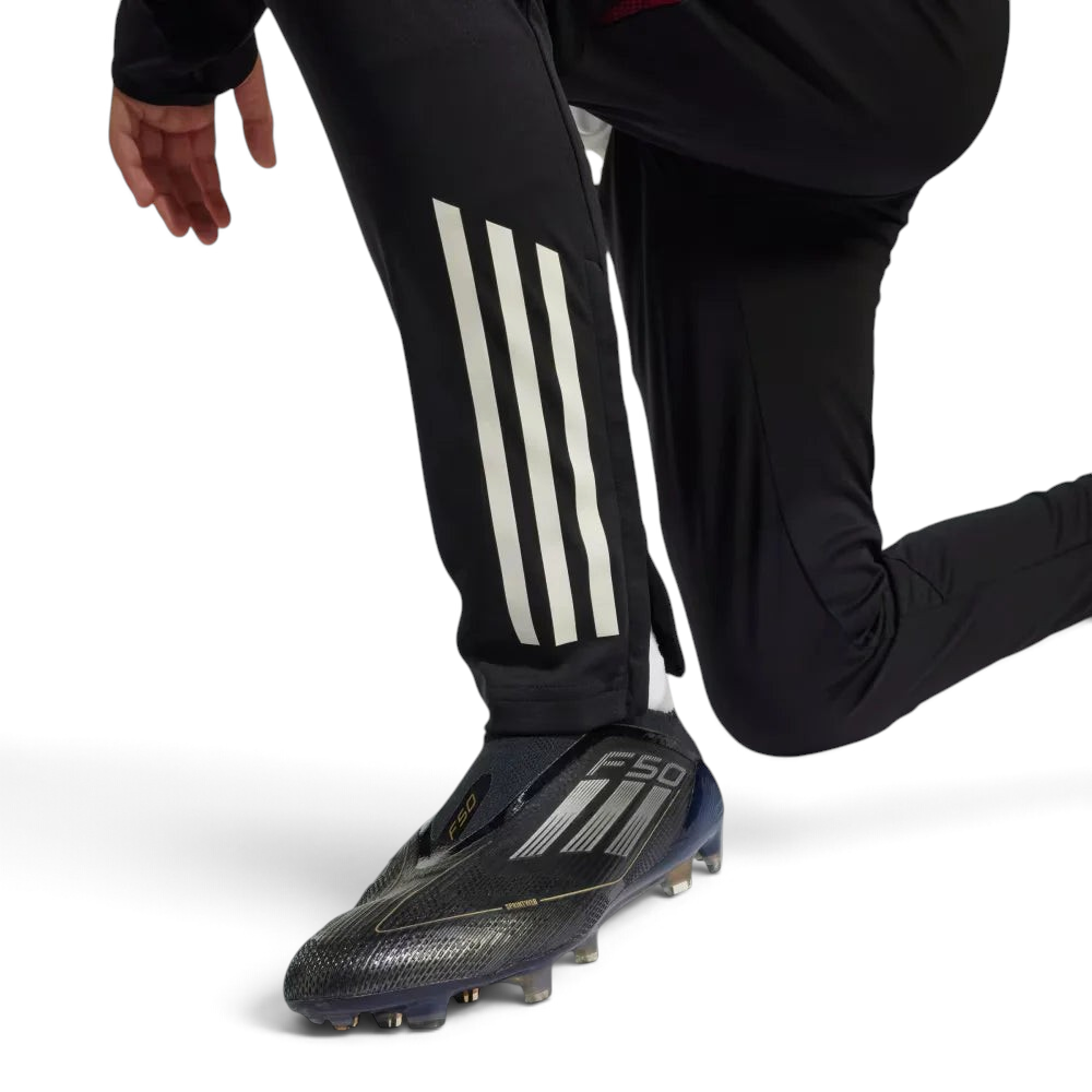 Zoom looking at the heat-applied 3 stripes, showcasing the intricate white detail and the premium finish on the black base.