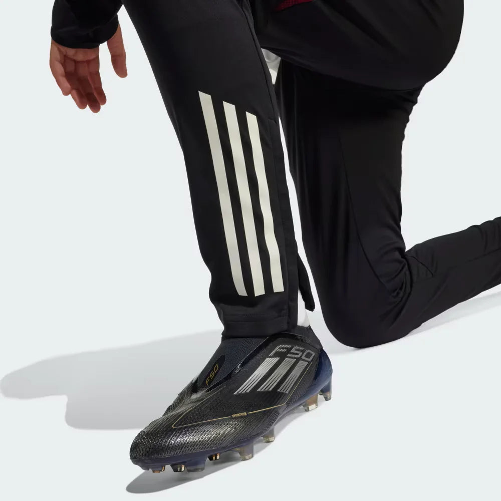 Zoom looking at the heat-applied 3 stripes, showcasing the intricate white detail and the premium finish on the black base.
