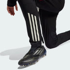 Zoom looking at the heat-applied 3 stripes, showcasing the intricate white detail and the premium finish on the black base.