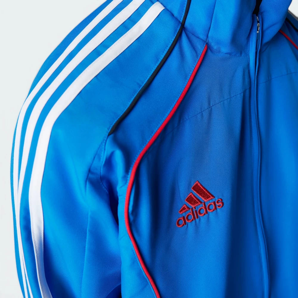 Details the high-definition embroidery of the legendary adidas logo and the crisp execution of the piping borders.