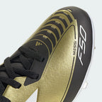 Close-up zoom on the front of the Adidas Messi F50 League FG/MG Juniors' boots, showing the Fibertouch upper texture, lacing system, and streamlined toe box.