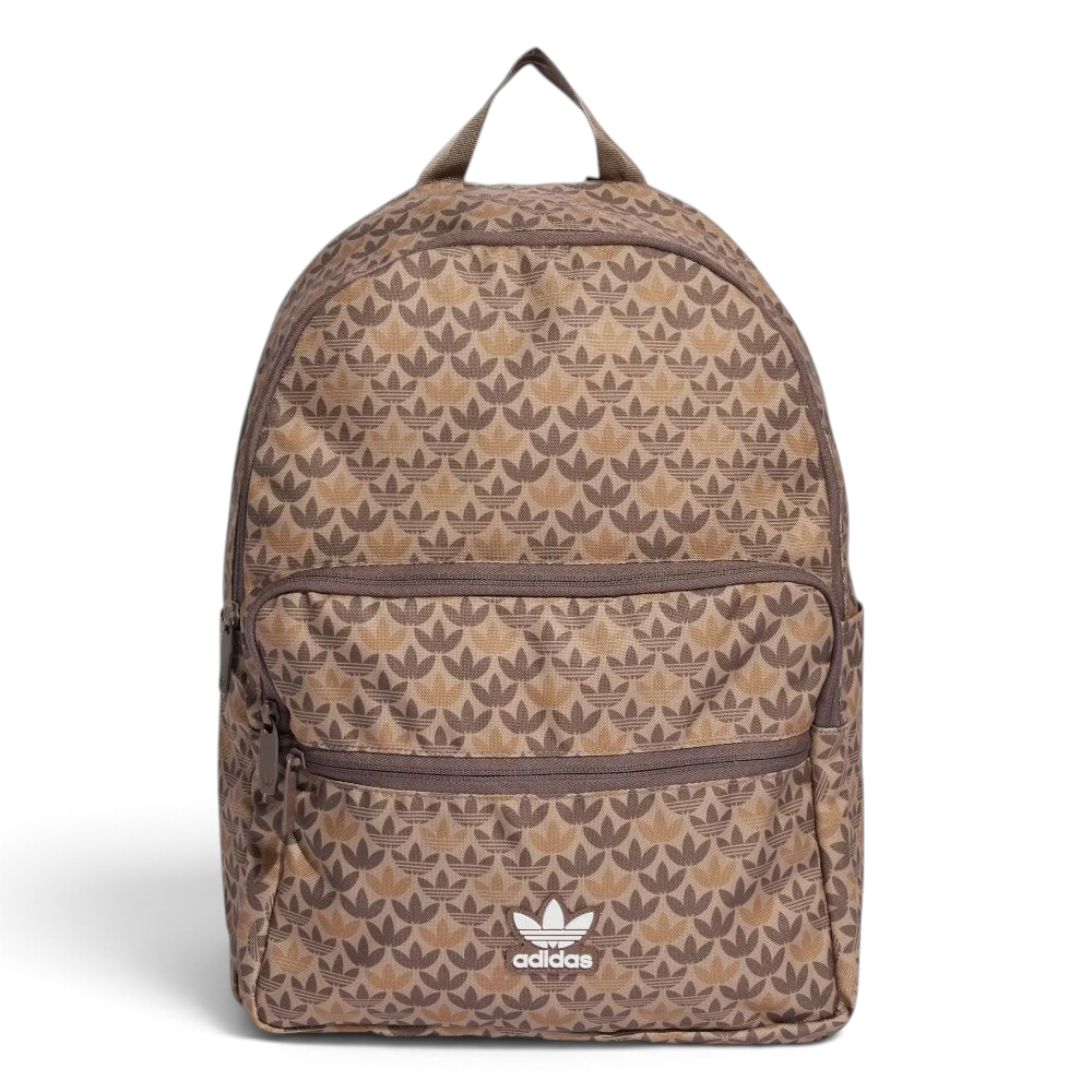Focuses on the full front dimensional view, showcasing the sharp contrast of the iconic white printed retro Trefoil logo badge against the repeating, two-tone brown monogram background canvas.