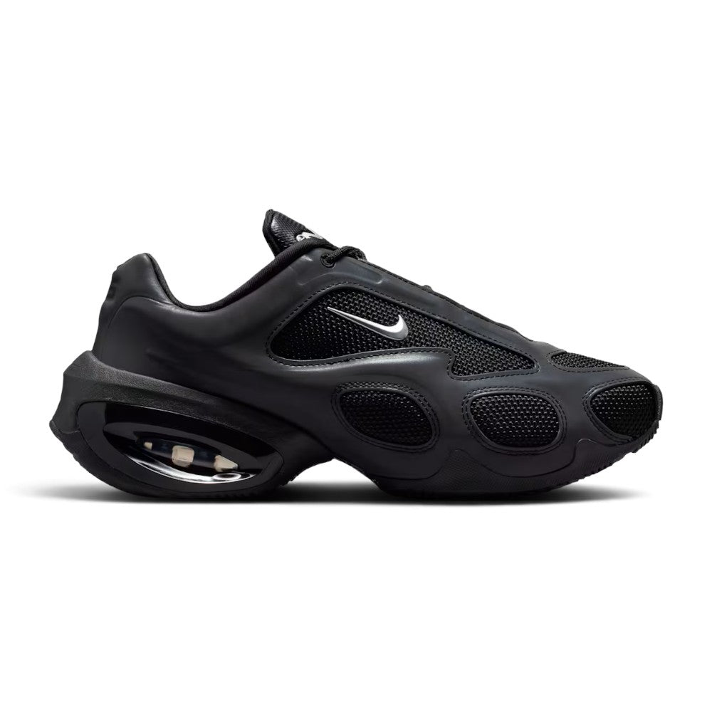 Highlights the futuristic lateral profile featuring an exaggerated high arch, rounded matte black synthetic overlays, black mesh pod inserts, a mini metallic silver Swoosh, and a sculpted black heel pod enclosing the visible Max Air cushioning unit.