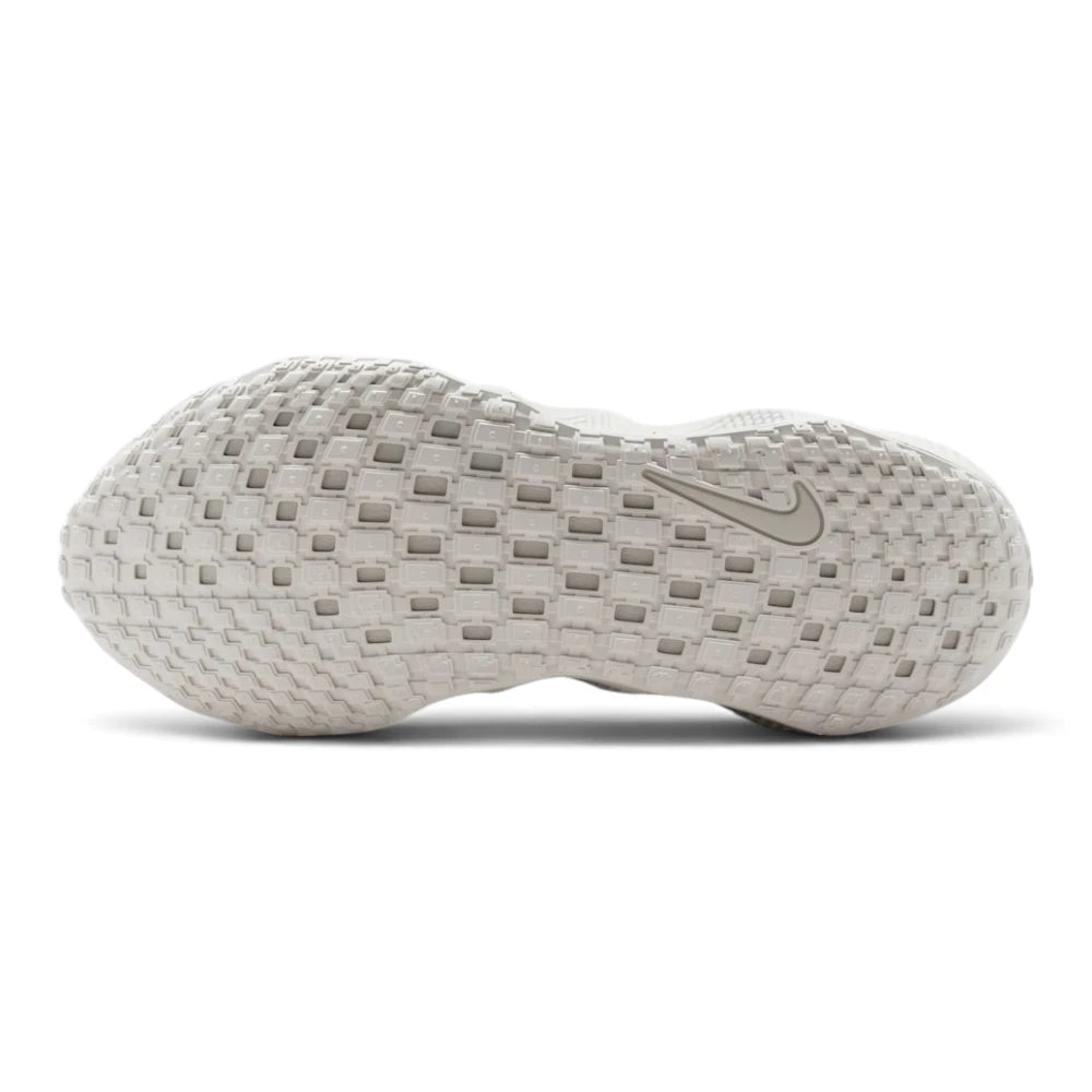Displays the full-length ultralight outsole, showcasing the thin strategic rubber tread pods designed for targeted grip and maximum flexibility.