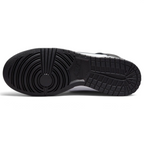 Displays the full-length solid black rubber sole, showcasing the classic basketball pivot-circle traction grid engineered for unreal multi-surface street grip.