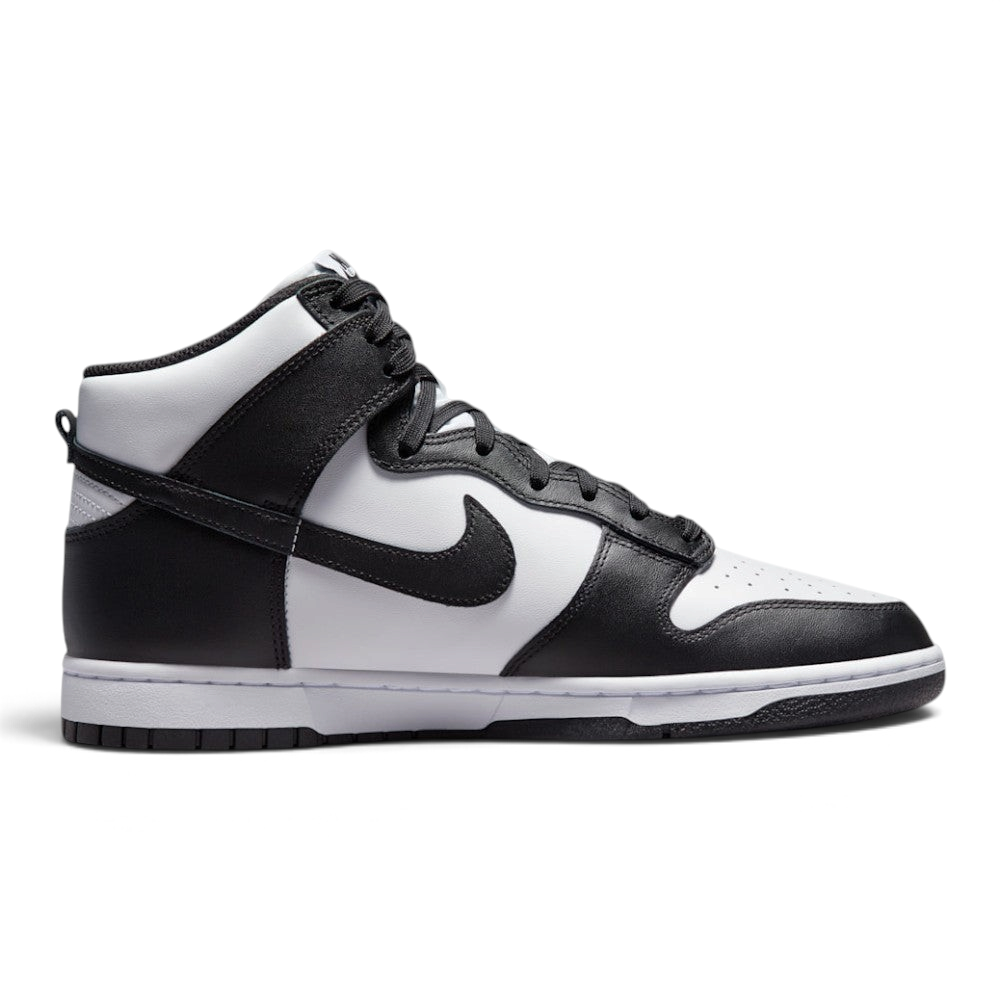 Highlights the high-velocity sweep of the black leather Nike Swoosh, showing the crisp white leather quarter panel, the dark leather overlays, the padded high-top collar, and the clean white midsole wall.