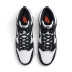 Focuses on the locked-in central lacing layout, displaying the symmetry of the white nylon tongue, black laces, black "NIKE" tongue patch, perforated toe box, and Total Orange "NIKE" branding printed on the black insoles.