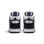 Focuses on the rear profile, highlighting the structured black leather heel counters, the white collar overlay, the black leather pull loops, and the sturdy white rubber midsole base.