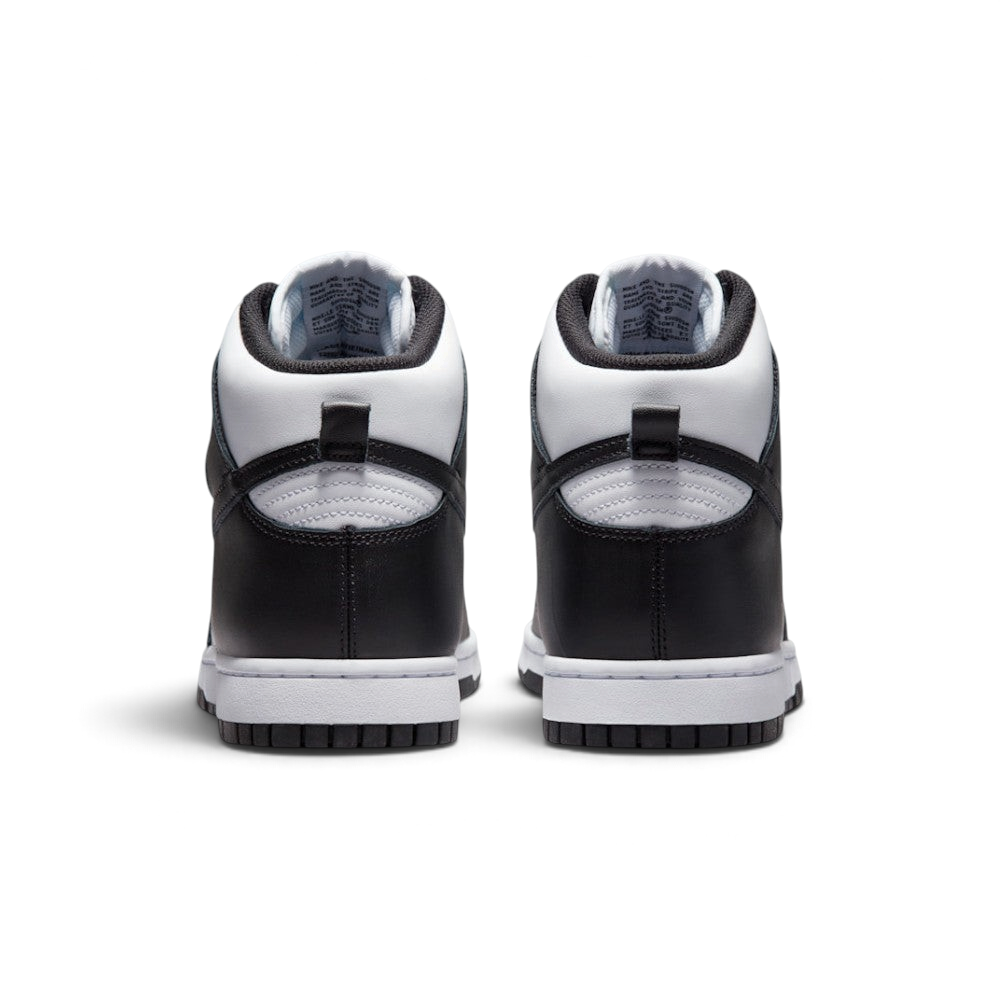 Focuses on the rear profile, highlighting the structured black leather heel counters, the white collar overlay, the black leather pull loops, and the sturdy white rubber midsole base.